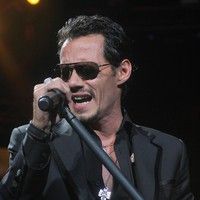 Marc Anthony performing live at the American Airlines Arena photos